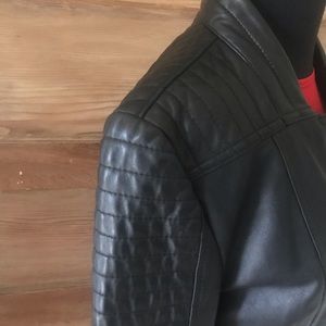 Black leather jacket. Motorcycle-style-inspired, rich, buttery leather.